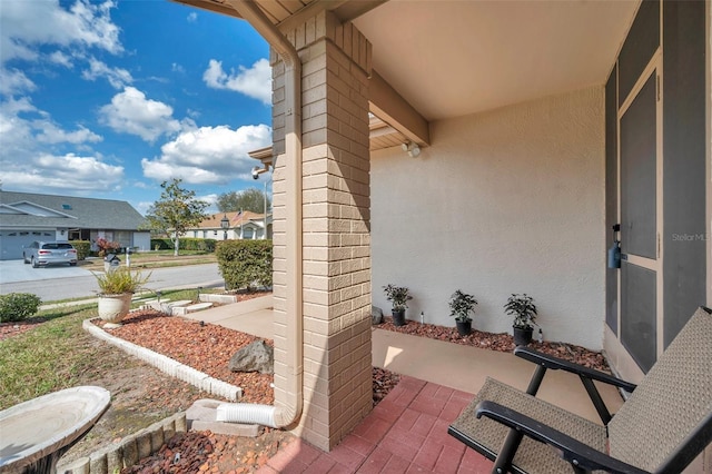 view of patio featuring a residential view