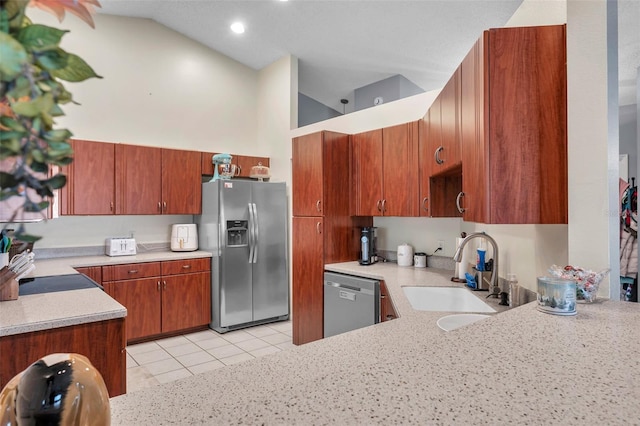 kitchen with light tile patterned floors, high vaulted ceiling, a sink, light countertops, and appliances with stainless steel finishes