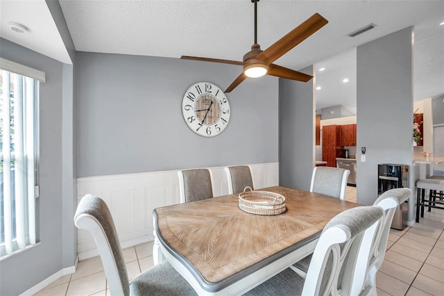 dining space featuring light tile patterned floors, recessed lighting, visible vents, a ceiling fan, and a textured ceiling