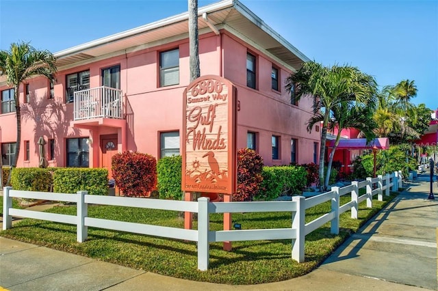 view of property featuring a fenced front yard