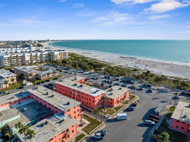 drone / aerial view with a view of the beach and a water view