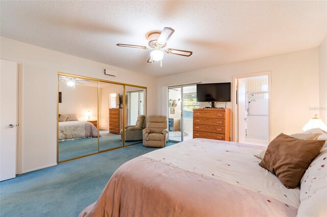 bedroom featuring a textured ceiling, ceiling fan, a closet, and carpet