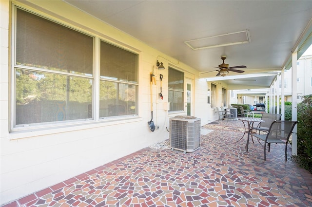 view of patio / terrace featuring cooling unit, ceiling fan, and outdoor dining space