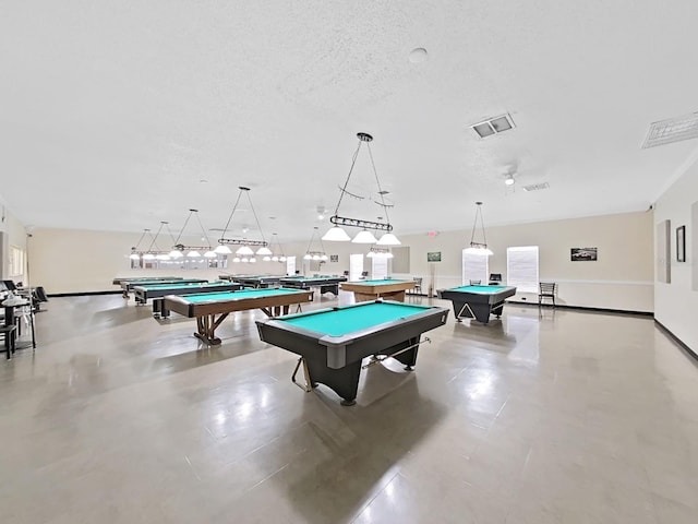 recreation room with billiards, visible vents, and a textured ceiling