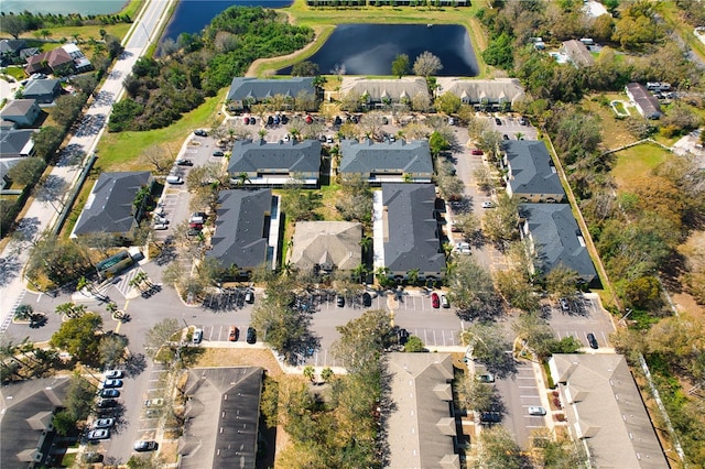 aerial view featuring a residential view and a water view