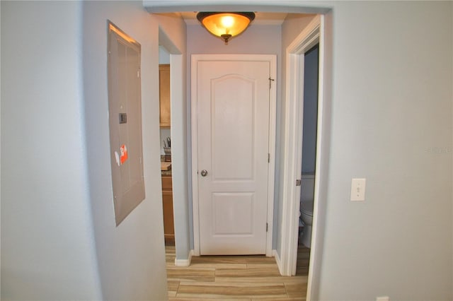 corridor featuring wood tiled floor