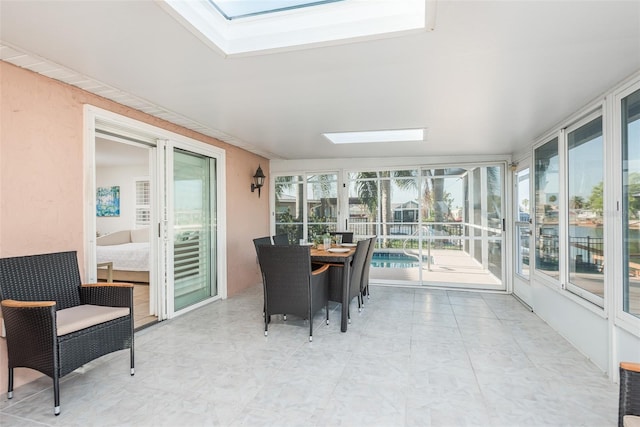 sunroom with a skylight