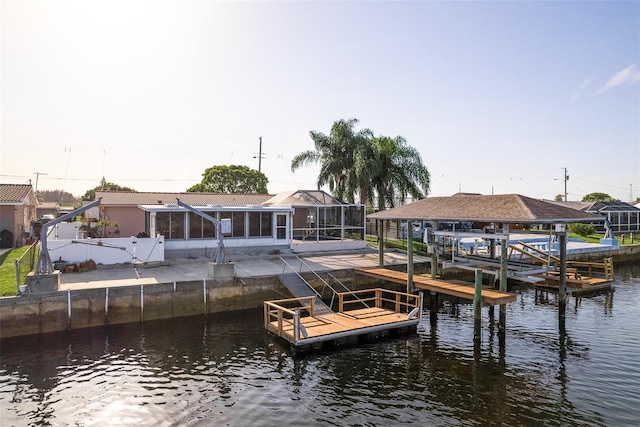 view of dock with a water view and boat lift