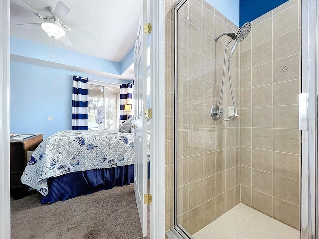 full bath with a stall shower, connected bathroom, and a ceiling fan