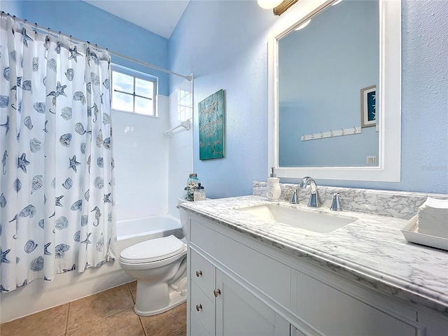 bathroom with shower / bath combo, vanity, toilet, and tile patterned floors