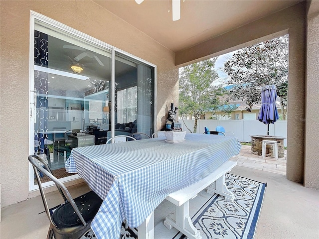 view of patio / terrace with fence and outdoor dining area