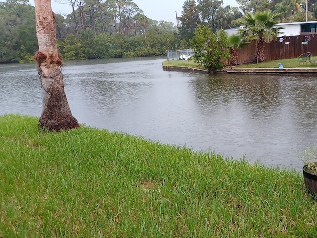 water view featuring fence