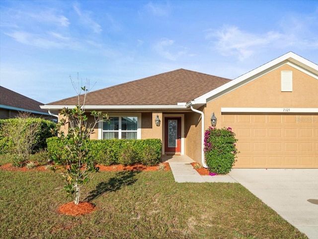 ranch-style house with a garage, concrete driveway, stucco siding, roof with shingles, and a front yard