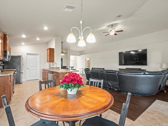 dining space featuring light tile patterned flooring, ceiling fan, visible vents, and recessed lighting