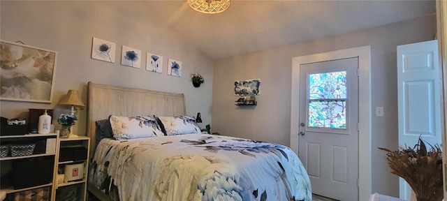 bedroom featuring vaulted ceiling