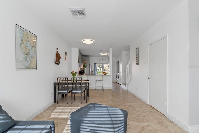 6027 Bayside Key Dr, Tampa, FL 33615 - hallway featuring visible vents and baseboards