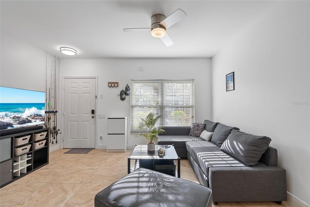6027 Bayside Key Dr, Tampa, FL 33615 - living room featuring ceiling fan and baseboards