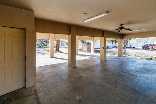 garage with a ceiling fan