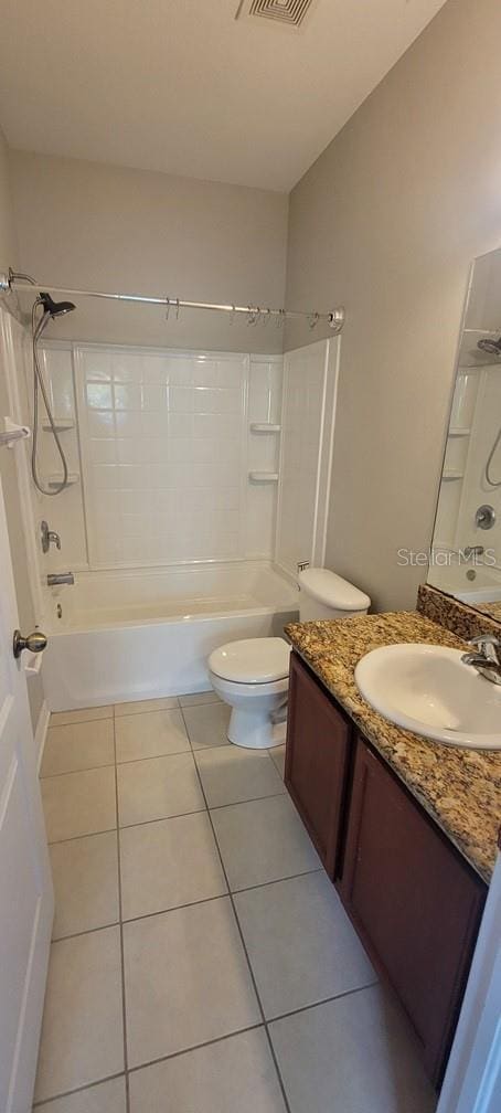 full bathroom featuring visible vents, toilet,  shower combination, tile patterned flooring, and vanity