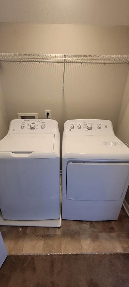 laundry area with laundry area and washer and dryer