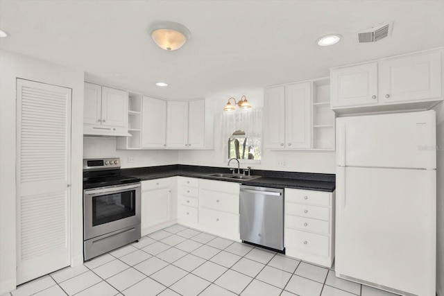 kitchen with stainless steel appliances, white cabinets, under cabinet range hood, and open shelves