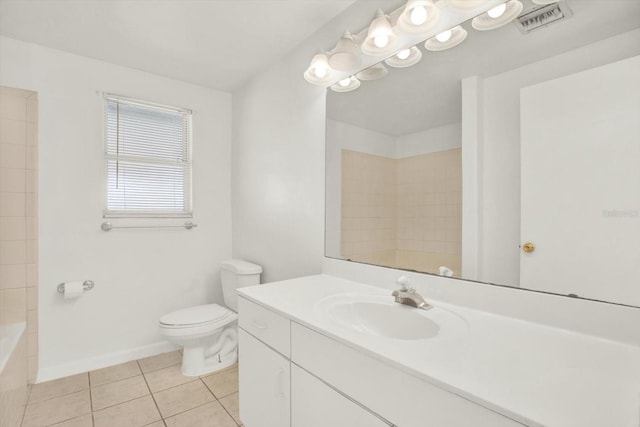 bathroom featuring baseboards, visible vents, toilet, tile patterned floors, and vanity