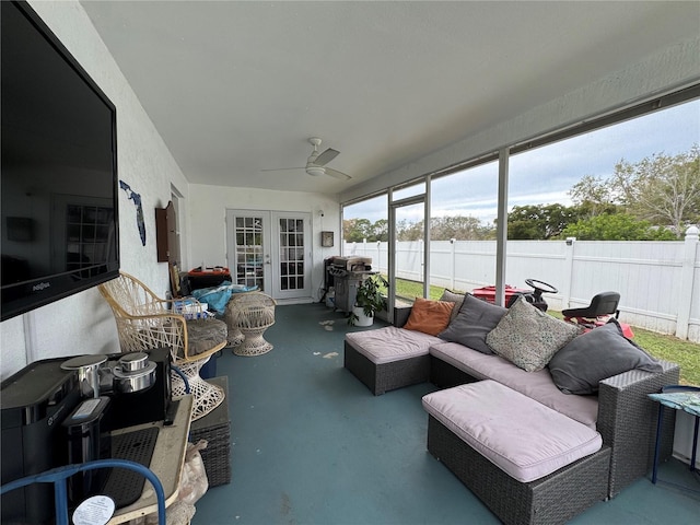 sunroom with french doors and ceiling fan