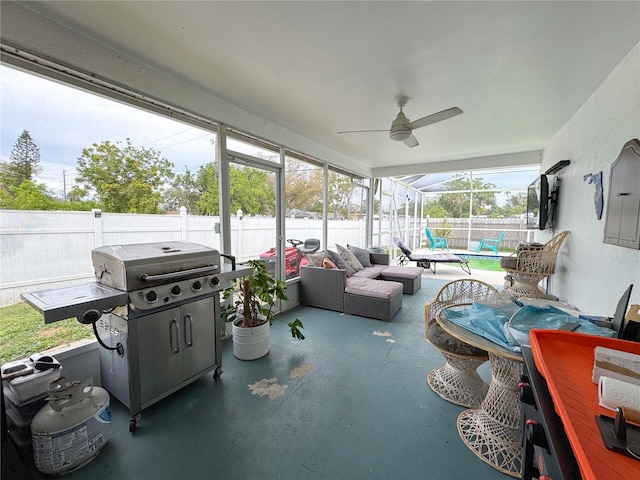 sunroom / solarium with ceiling fan