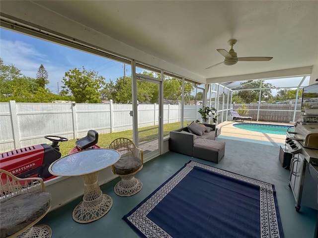 sunroom / solarium with ceiling fan