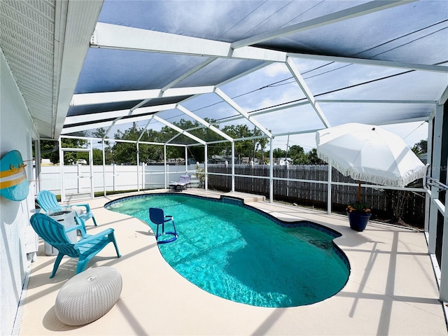 5801 65th Ter N, Pinellas Park, FL 33781 - view of swimming pool with a fenced backyard, a patio, and a lanai