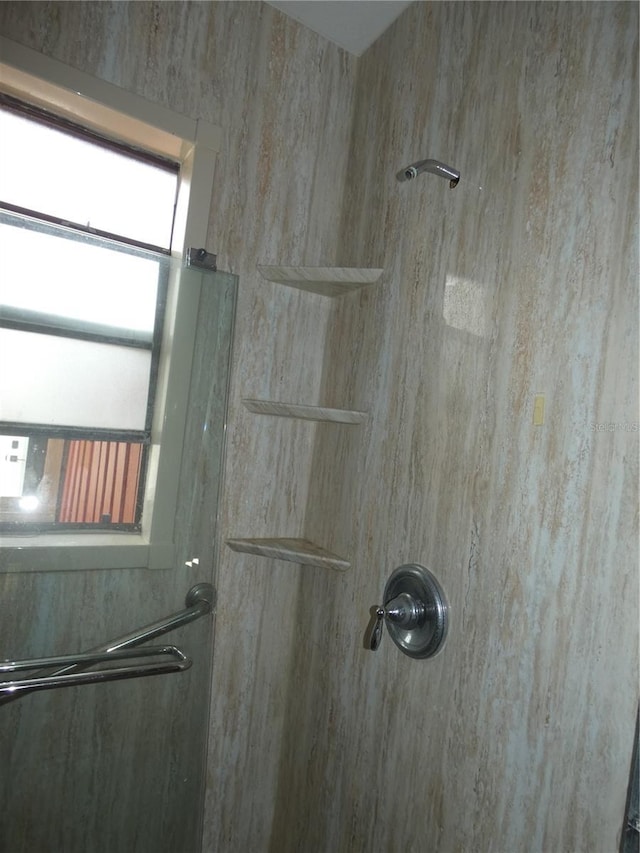7308 Mako Dr, Hudson, FL 34667 - room details featuring a shower with door