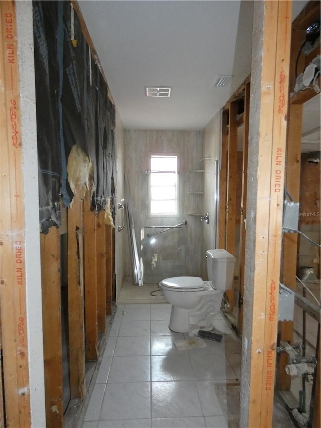 7308 Mako Dr, Hudson, FL 34667 - bathroom featuring toilet, tile patterned flooring, and visible vents