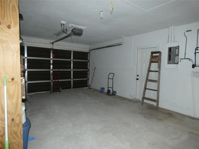 7308 Mako Dr, Hudson, FL 34667 - garage with a garage door opener and electric panel