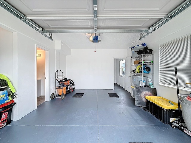 garage featuring a garage door opener