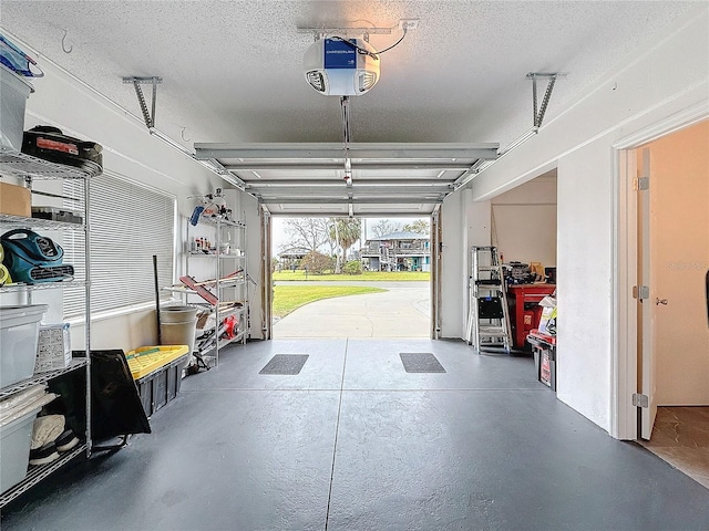 garage featuring a garage door opener