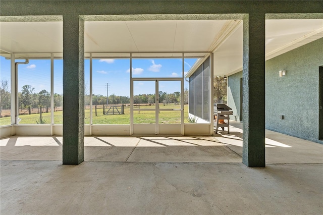 view of unfurnished sunroom