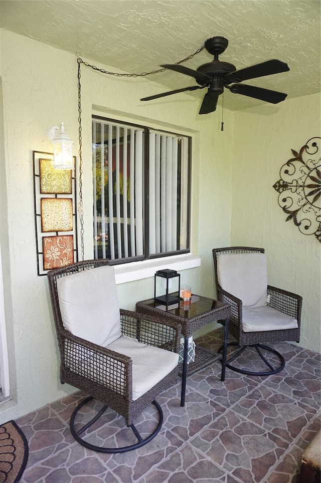 view of patio / terrace featuring ceiling fan