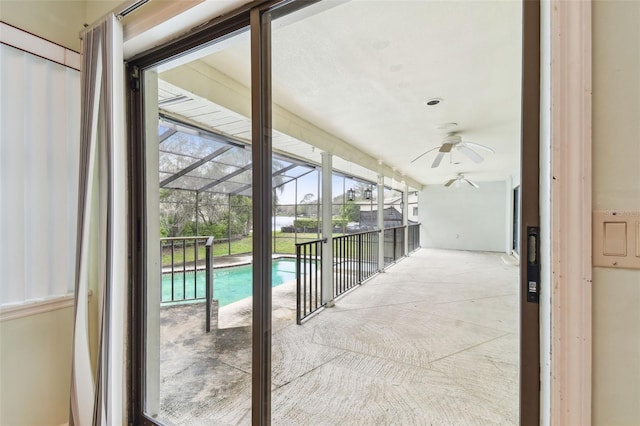 view of pool with ceiling fan