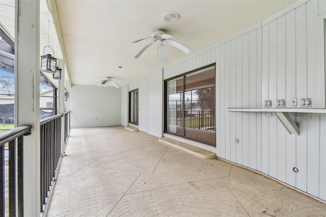 exterior space with a ceiling fan