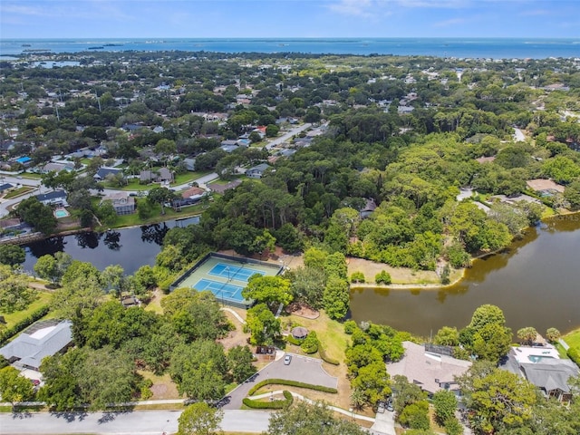 bird's eye view with a water view and a residential view