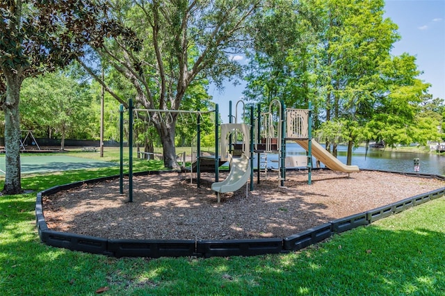 community playground with a lawn and a water view