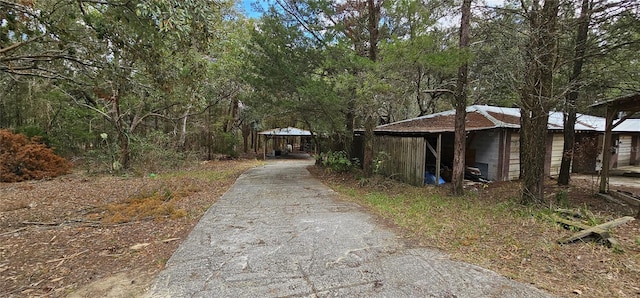 view of road featuring driveway