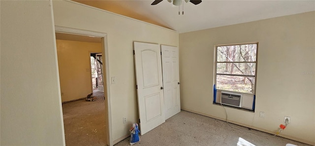 unfurnished bedroom featuring lofted ceiling, ceiling fan, and cooling unit