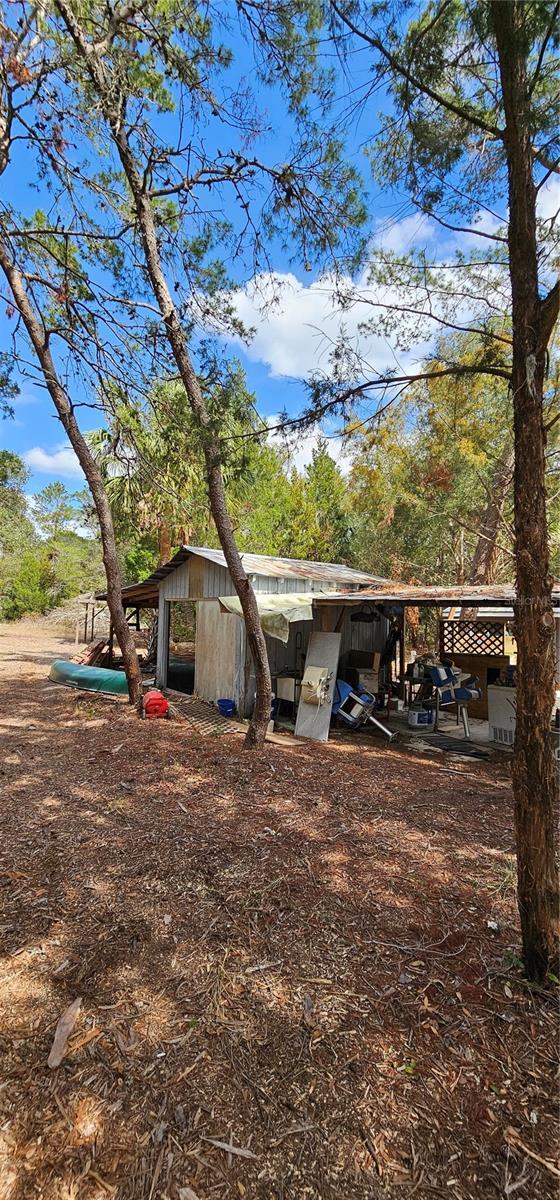 exterior space with an outbuilding and an outdoor structure