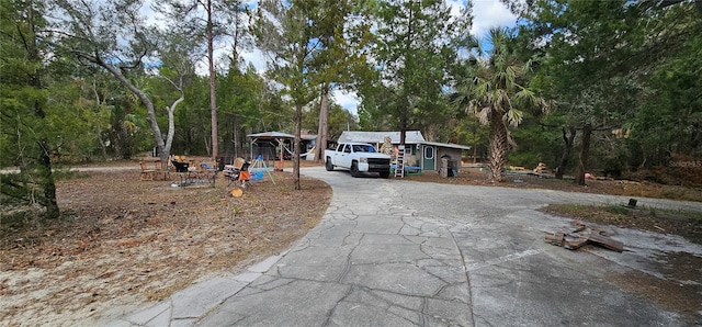 view of front of home with aphalt driveway