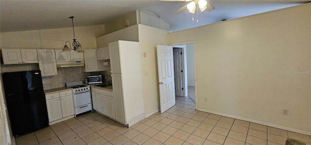 11617 Duda Rd, Hudson, FL 34667 - kitchen featuring freestanding refrigerator, gas range gas stove, under cabinet range hood, ceiling fan, and decorative backsplash