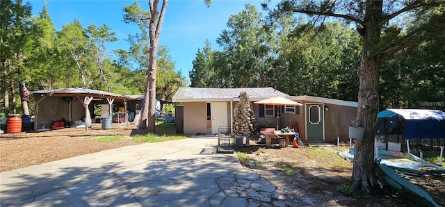 11617 Duda Rd, Hudson, FL 34667 - view of front of home featuring concrete driveway and stucco siding