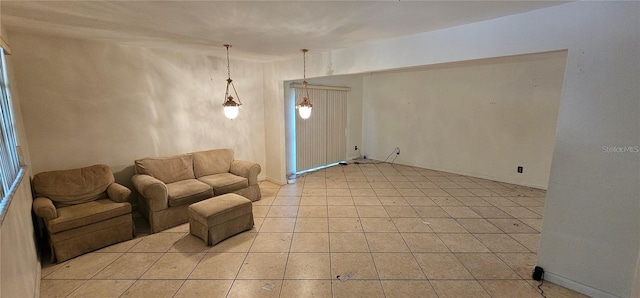 17932 Wendy Sue Ave, Hudson, FL 34667 - living room featuring light tile patterned floors