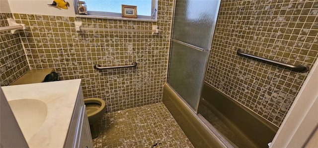 17932 Wendy Sue Ave, Hudson, FL 34667 - full bath with tile walls, vanity, and shower / bath combination with glass door