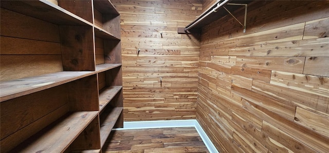 17932 Wendy Sue Ave, Hudson, FL 34667 - spacious closet featuring wood finished floors